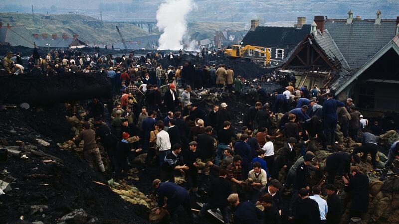 Hundreds of rescue workers dig into a huge pile of rubble after thousands of tons of coal pit waste slid down onto Aberfan, a village in south Wales, on October 21st, 1966, killing 116 children and 28 adults. Photograph: Getty Images