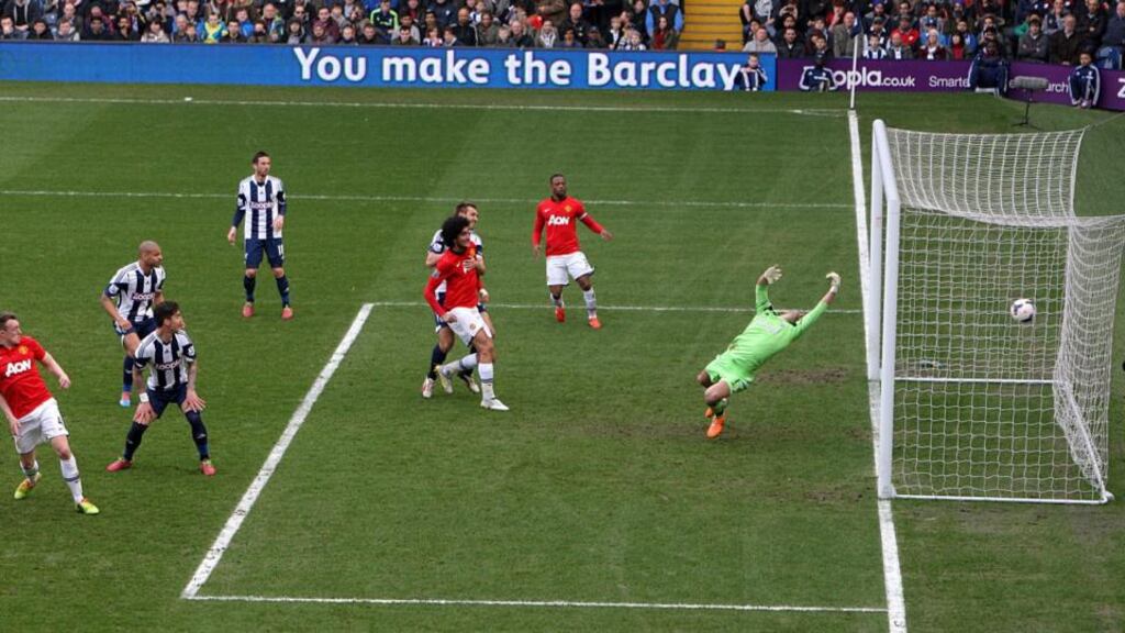 Manchester United’s Phil Jones scores his team’s opening goal. Photograph: Nick Potts/PA Wire.
