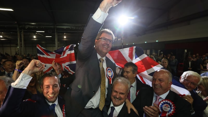 The DUP’s Jeffrey Donaldson celebrates following his election at the Eikon Exhibition Centre in Lisburn. Photograph : Brian Lawless/PA