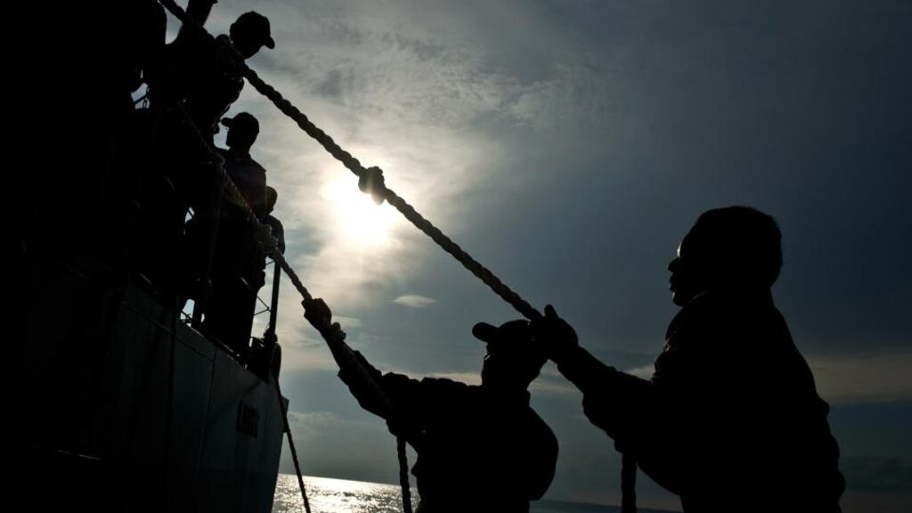 Royal Malaysian Navy personnel during a search and rescue mission for boat-people, near the Thai-Malaysia border. After fierce international criticism, Malaysia has reversed its policy of sending boats back to sea. Photograph: Manan Vatsyayana/AFP/Getty Images