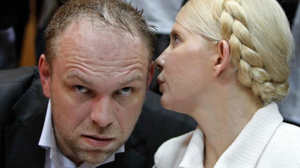 Former Ukrainian prime minister Yulia Tymoshenko converses with her lawyer Serhiy Vlasenko. Photograph: Gleb Garanich/Reuters