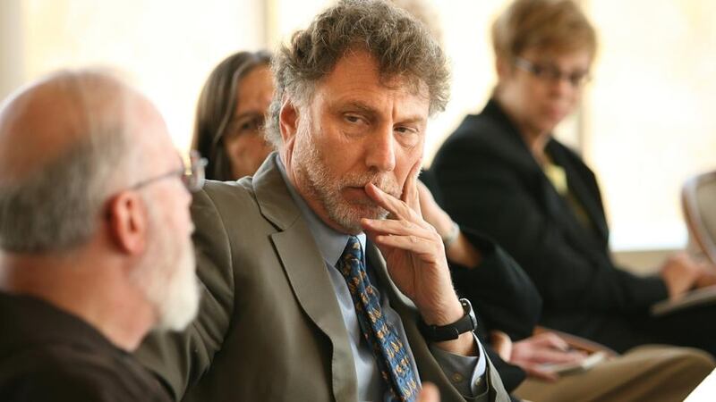 In the spotlight: Marty Baron listens as Cardinal Sean O’Malley speaks during a meeting between the Boston Globe and the Catholic heirarchy in 2006. Photograph: Dina Rudick/Boston Globe via Getty