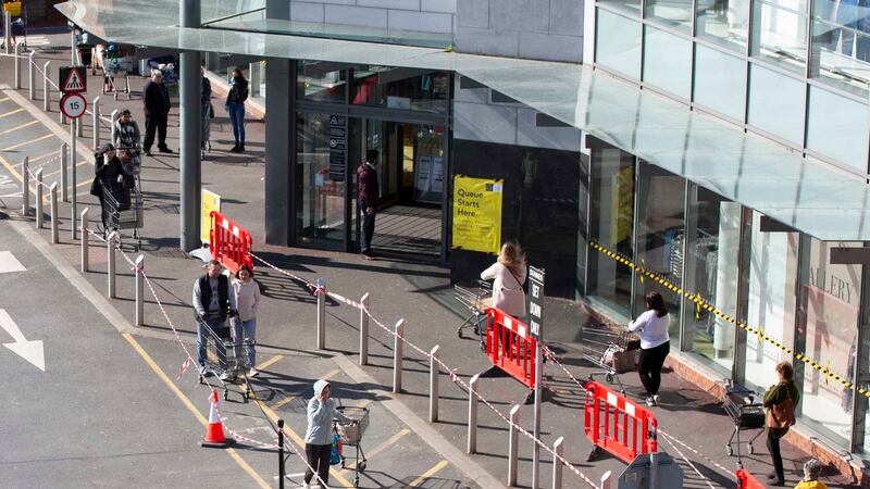 Shoppers queue outside Dunnes Stores   in Ennis, Co Clare. Photograph: Press 22