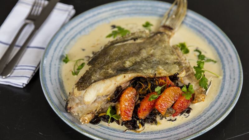 John Dory with mushrooms and orange. Photograph: Emma Jervis