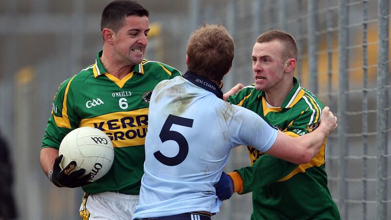 Paul Griffin of Dublin clashes with Aidan O’Mahony and Barry John Keane of Kerry in their Allianz Football National League Round 1 match in February 2010. Photograph: Donall Farmer/Inpho