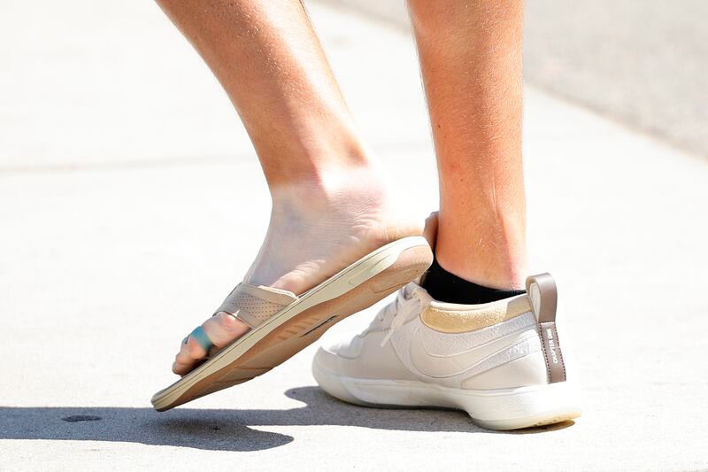 Jon Rahm walks to his press conference wearing one shoe and one flip-flop at the US Open in Pinehurst, North Carolina. Photograph: Alex Slitz/Getty Images