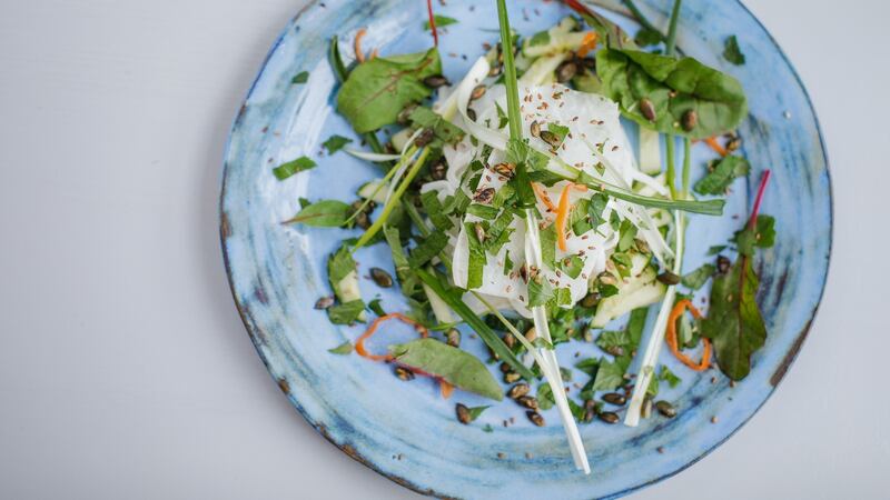 Spring onion, daikon and cucumber salad with toasted pumpkin and sunflower seeds. Photograph: Emma Jervis