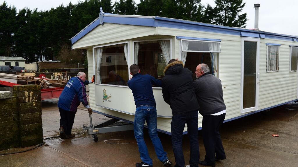 A mobile home being removed for transportation following an eviction notice at the site in Woodland Park, Dundalk, Co Louth. Photograph: Dara Mac Dónaill