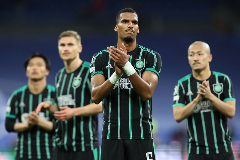Celtic's German defender Moritz Jenz applauds the fans at the end of the Champions League defeat to Real Madrid at the Santiago Bernabeu stadium in Madrid. Photograph: Thomas Coex/AFP/via Getty Images