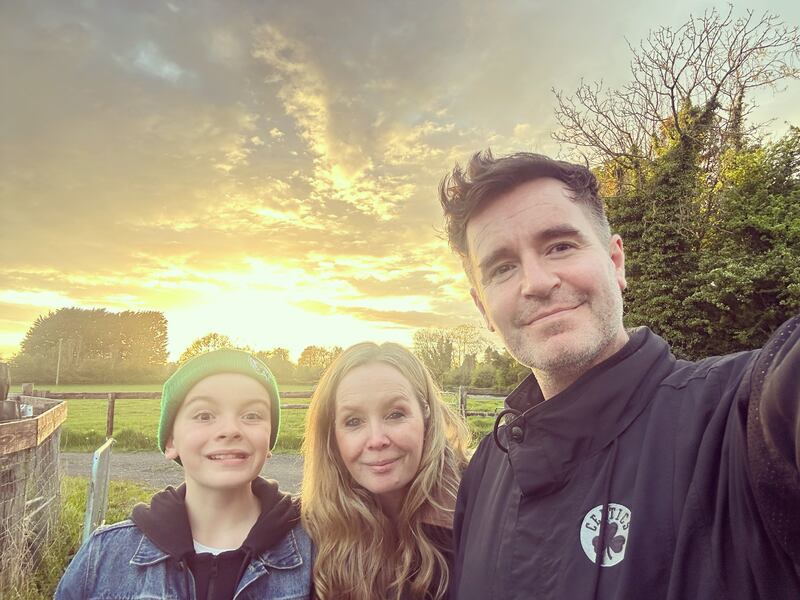 Jarlath Regan with his wife, Tina, and their son