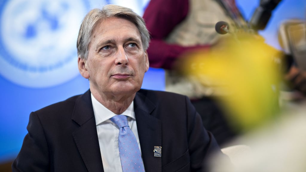 Philip Hammond, U.K. chancellor of the exchequer, sits during an International Monetary Fund Committee (IMFC) plenary session at the International Monetary Fund (IMF) and World Bank Group Annual Meetings in Washington, D.C., U.S., on Saturday, Oct. 14, 2017. Photographer: Andrew Harrer/Bloomberg