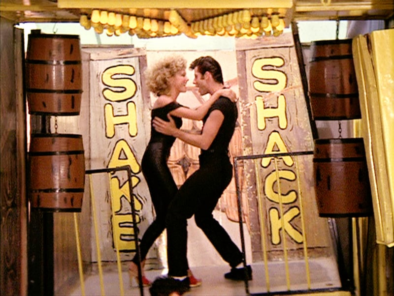 Newton-John with John Travolta in 1978’s Grease. Photograph: Paramount Pictures/CBS/Getty Images