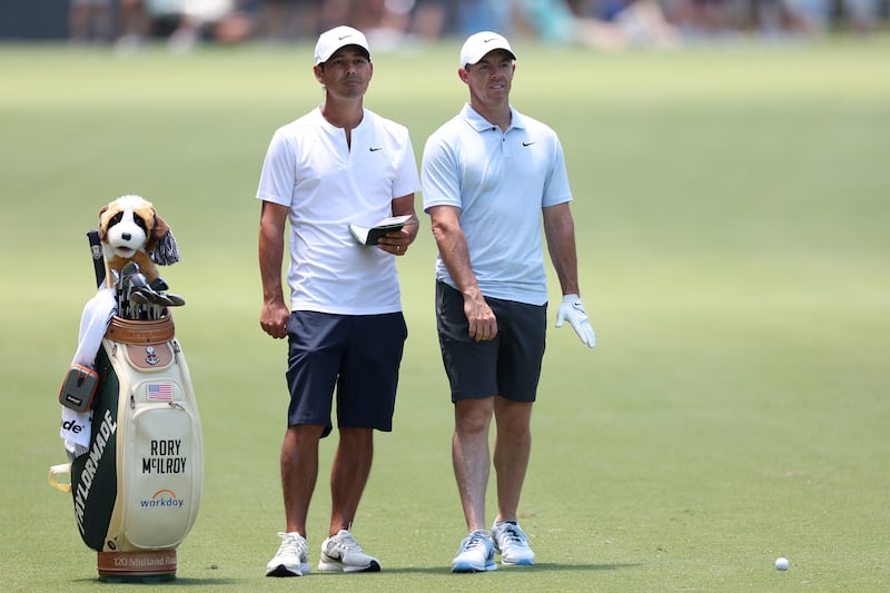 Rory McIlroy and his caddie Harry Diamond during a practice round for the US Open. Photograph: Gregory Shamus/Getty Images