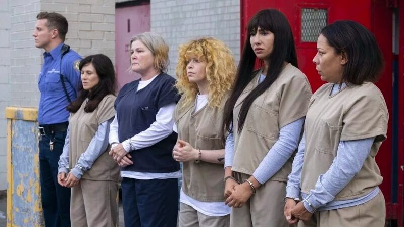 Kate Mulgrew (third from left) as Red in Orange Is the New Black, which returns to Netflix for its final season on July 26th