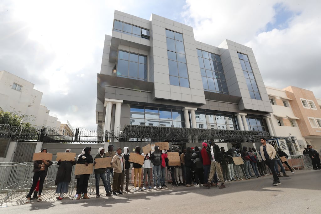 Sub-Saharan African migrants protest outside the headquarters of the International Organisation for Migration this week to demand their evacuation to their country of origin in Tunis, Tunisia. Photograph: Mohamed Messara/EPA