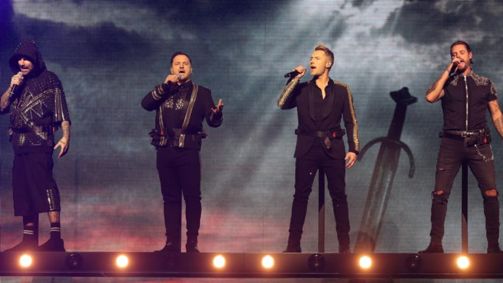 Shane Lynch, Mikey Graham, Ronan Keating and Keith Duffy of Boyzone on stage at the SSE Arena, Belfast. Photograph: Niall Carson/PA Wire