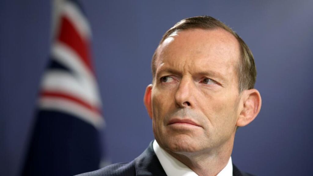 Australian prime minister Tony Abbott: criticised for saying “probly” instead of “probably” and “gumment” for “government”. Photograph: Rick Rycroft/AP