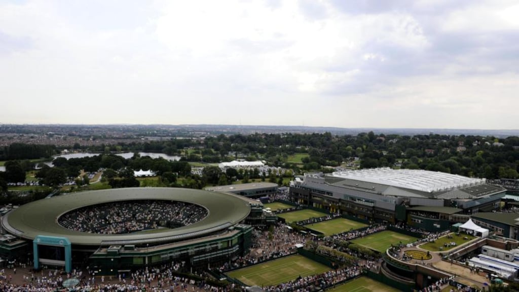 Wimbledon’s Centre Court (right) with the roof on and Court One (left) at the All England Lawn Tennis and Croquet Club. Photograph: Rebecca Naden/PA Wire.