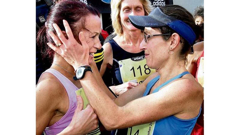Kealy (with visor), first Irish woman to finish the Dublin City Marathon, 2009.