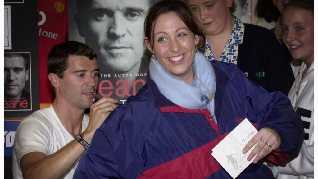 Roy Keane signing the back of Sadie McCarthy’s jacket at the book signing of his first autobiography in Easons, Patrick Street, Cork. Photograph: Alan Betson