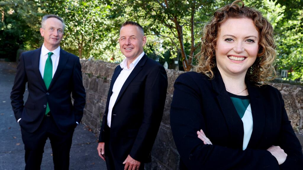 Leo Clancy, chief executive of Enterprise Ireland, with Greg Hayden, co-founder of  Ethos, and Alison Heffernan, head of people at Ethos