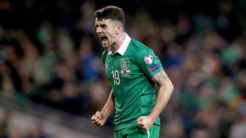 Robbie Brady celebrates Shane Long’s goal. Brady’s corner provided the equaliser so he should be forgiven for his role in tghe Poland goal. Photograph: Donall Farmer/Inpho