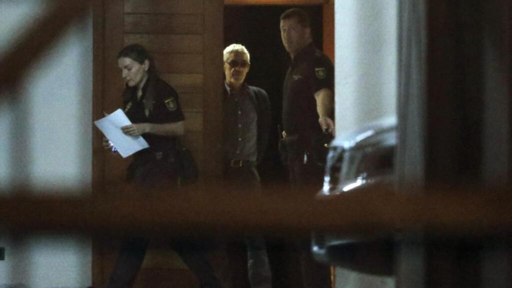 Train driver Francisco José Garzón Amo (centre) leaves the court following his release in Santiago de Compostela last Sunday. Photograph: Lalo R Villar/AP
