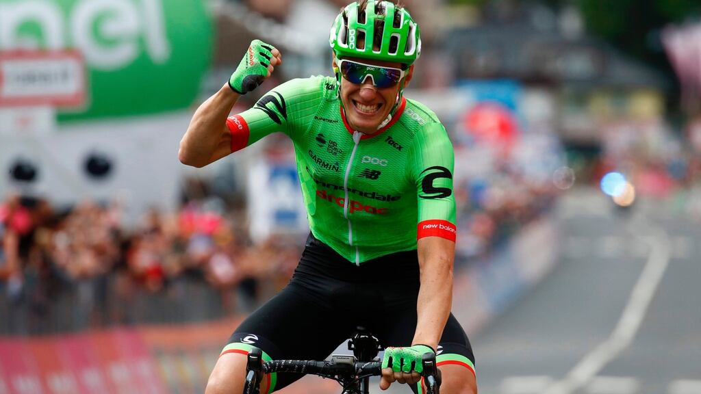 France’s Pierre Rolland of Cannondale-Drapac celebrates as he crosses the finish line to win the 17th stage of the 100th Giro d’Italia from Tirano to Canazei. Photograph: Luk Benies/AFP/Getty Images