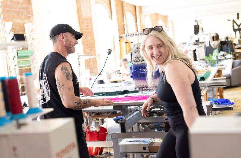 Tomasina Smyth, director and dress designer, and Liam McDaid, Amach fashion designer, working in Rosemount Factory in Derry. Photograph: Joe Dunne