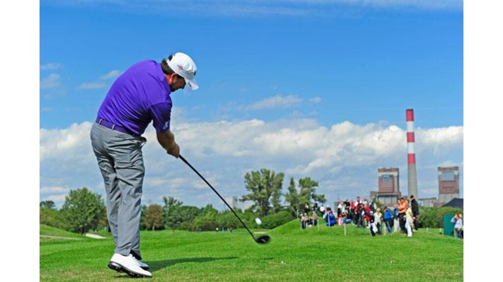 Graeme McDowell plays his tee shot on the seventh hole during the first round of the Austrian Open at the Diamond Country Club in Atzenbrugg near Vienna, Austria. (Photograph: Stuart Franklin/Getty Images)