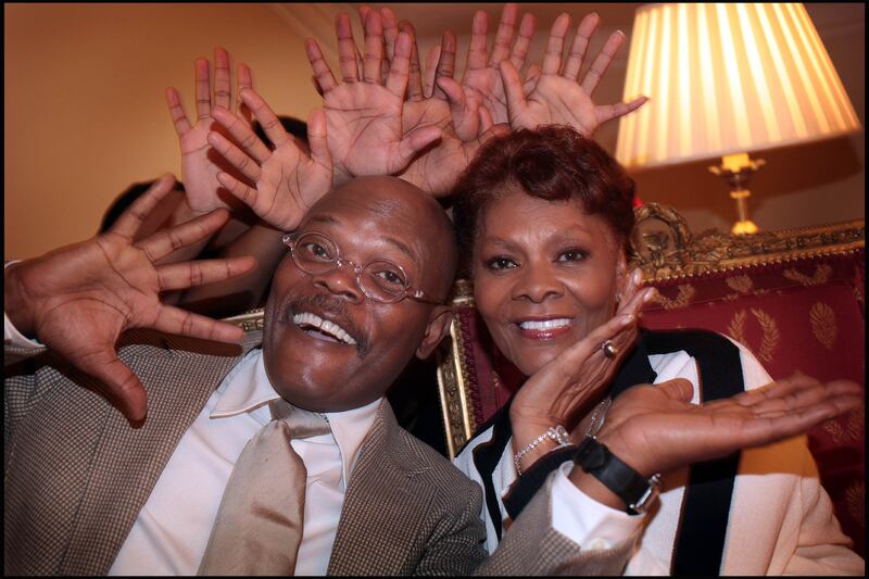 Actor Samual L .Jackson and singer Dionne Warwick in the American Ambassadors Residence in the Phoenix Park Dublin with members of the New York City based Soul Stepdance singers who were in Ireland for Irish American History month in 2010.  Photograph: Brenda Fitzsimons/The Irish Times