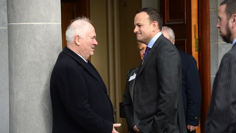 Taoiseach Leo Varadkar speaks to  former taoiseach John Bruton at the funeral of the late Fine Gael politician Richie Ryan in  Mount Merrion, Dublin on Wednesday. Photograph: Dara Mac Dónaill/The Irish Times.