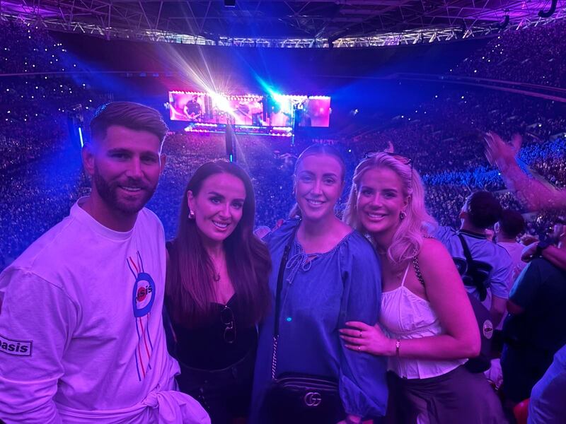 Sinéad Bailey with husband Billy and her sisters Stephanie and Shona at the Oasis gig in Wembley, London