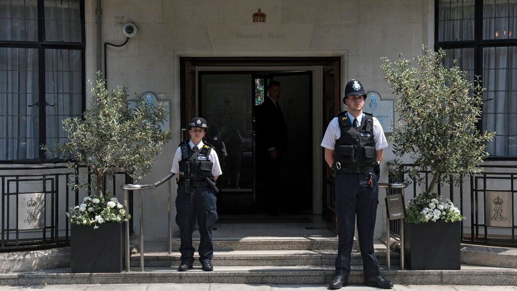 Police keep guard outside the King Edward VII hospital where Prince Philip, Duke of Edinburgh is admitted in Central London. Photograph: Will Oliver/EPA