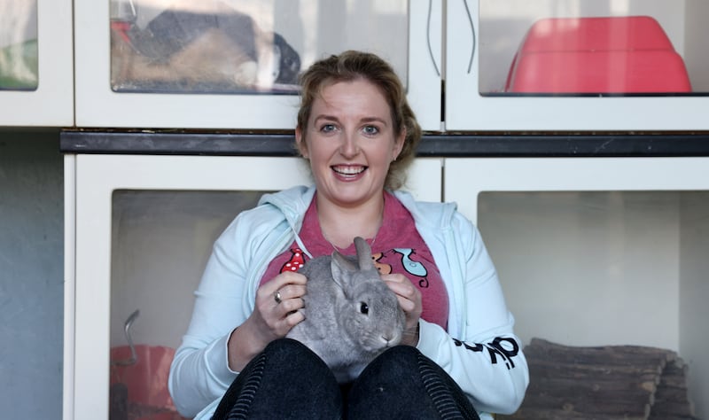 Emma Martin takes in cats and other small pets such as rabbits when families are away on holiday. Photograph: Laura Hutton