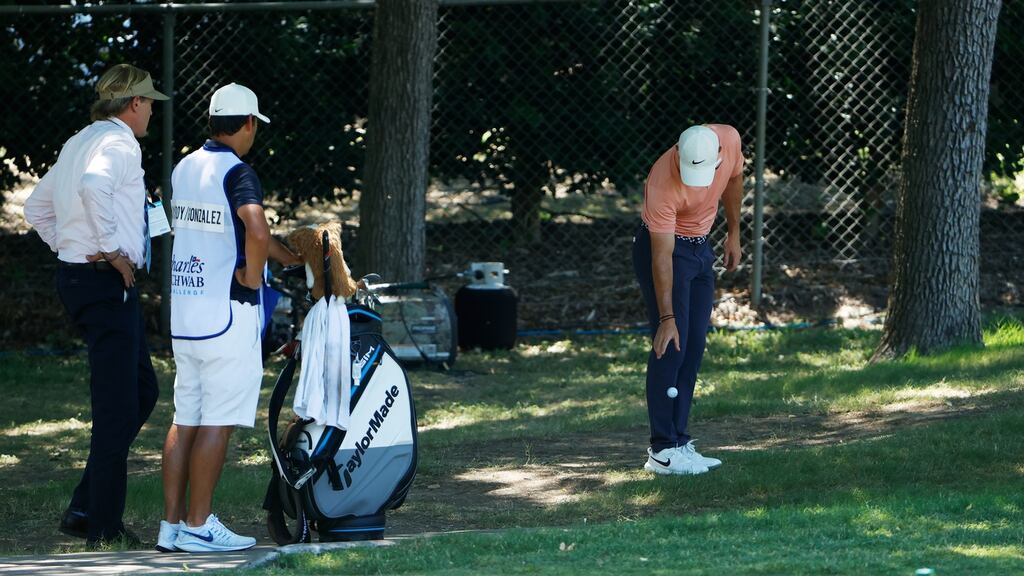 Rory McIlroy takes a drop on the first hole during his final round in Texas. Photograph: Tom Pennington/Getty