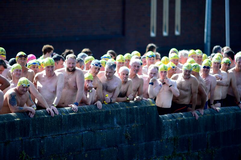 Swimmers at the start of the men's race during the annual Liffey Swim. Photograph: Cyril Byrne
