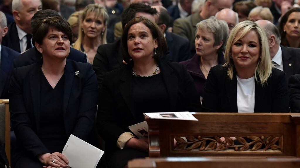 DUP’s Arlene Foster  with Sinn Féin’s Mary Lou McDonald and Michelle O’Neill at the funeral service for murdered journalist Lyra McKee in Belfast on Wednesday. Photograph:  Charles McQuillan/Pool via Reuters