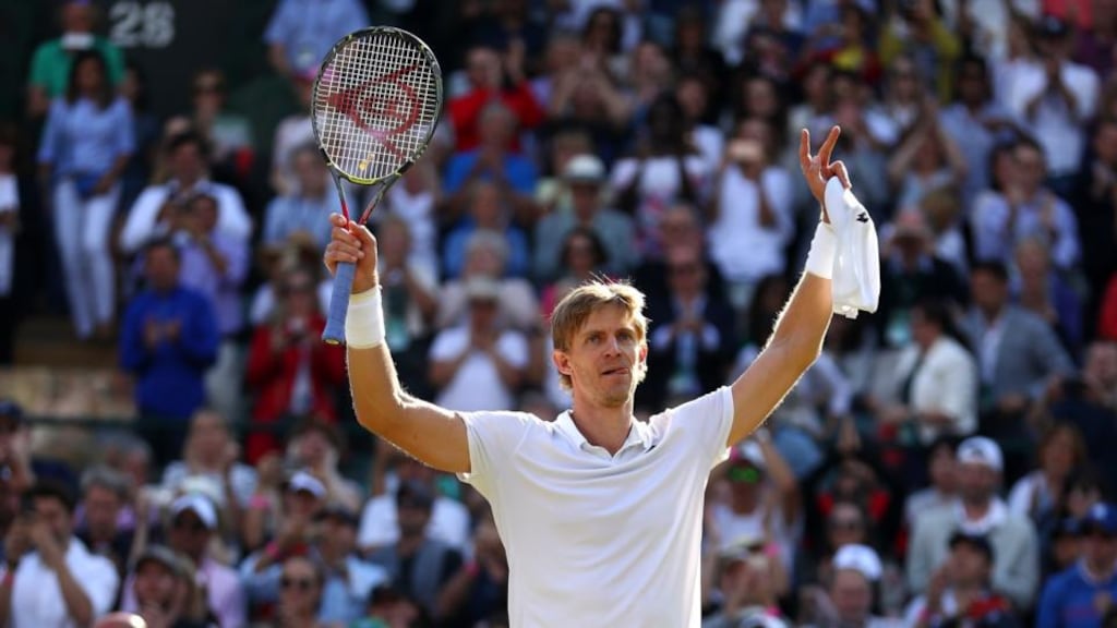 Kevin Anderson celebrates winning match point against Roger Federer during their men’s singles quarter-finals at Wimbledon. Photograph: Michael Steele/Getty Images
