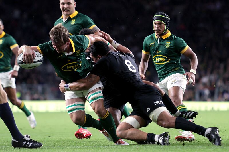 Try again: South Africa's Kwagga Smith scores against New Zealand at Twickenham despite the best efforts of Ardie Savea. Photograph: Laszlo Geczo/Inpho