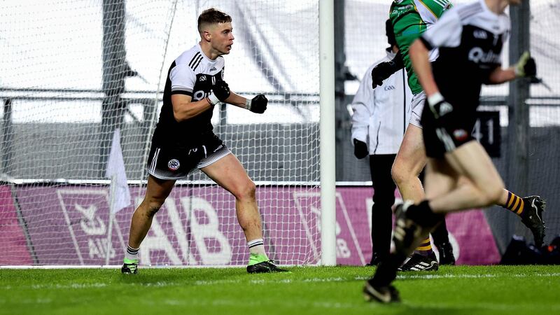 Jerome Johnston celebrates his late goal for Kilcoo. Photograph:  Ryan Byrne/Inpho