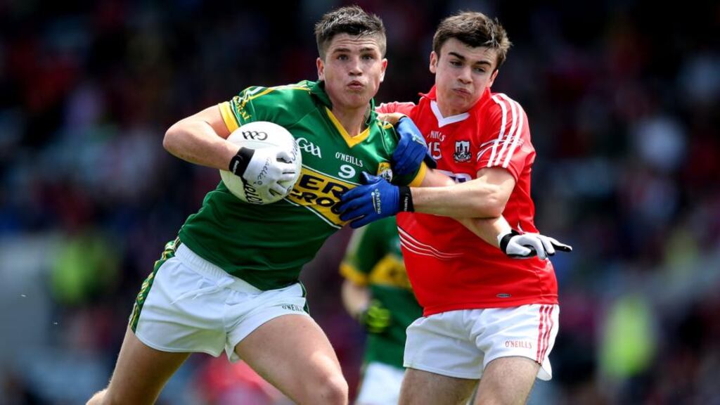 Kerry’s Liam Kearney and Gary Murphy of Cork tussle for possession in this year’s Munster Championship minor football final. Photograph: James Crombie/Inpho