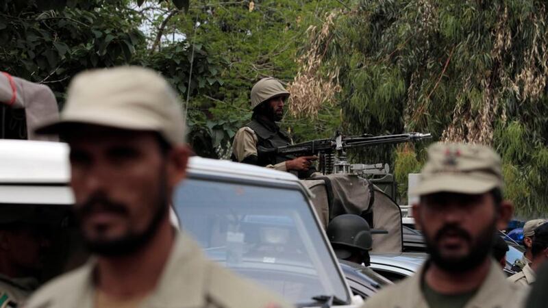 Security officials stand during the hearing of former Pakistani president Pervez Musharraf, who is the head of the All Pakistan Muslim League (APML) political party, outside the anti-terrorism court (ATC) in Rawalpindi last week. Photograph: Faisal Mahmood/Reuters