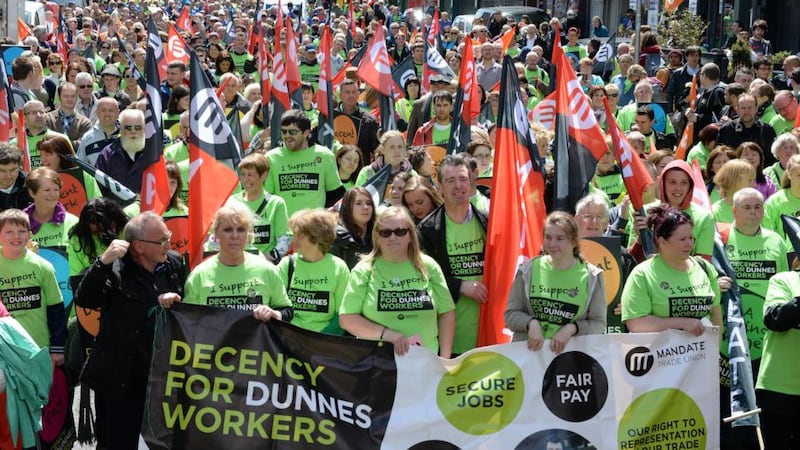 People taking part in a protest rally in Dublin on Saturday in support of a campaign for improved conditions of employment for workers at Dunnes Stores. Photograph: Eric Luke / The Irish Times