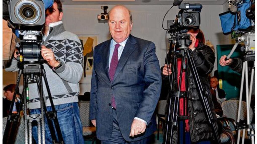 Michael Noonan at a press conference announcing the ending of the bank guarantee. photograph: eric luke