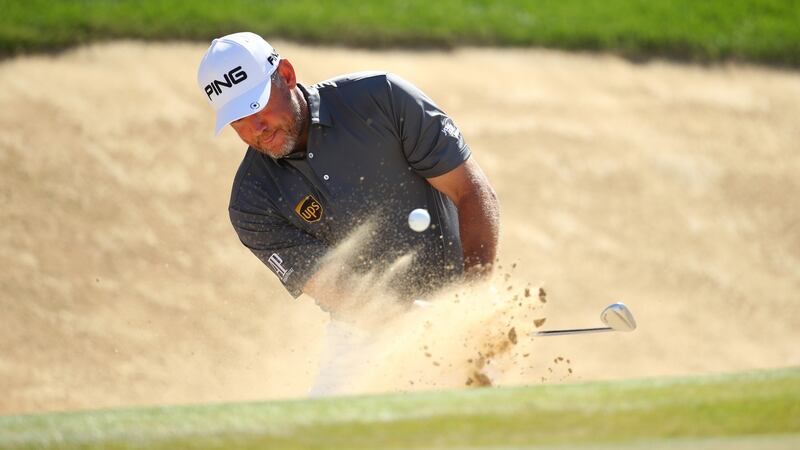 Lee Westwood of England celebrates after winning the Abu Dhabi HSBC Championship. Photo: Warren Little/Getty Images