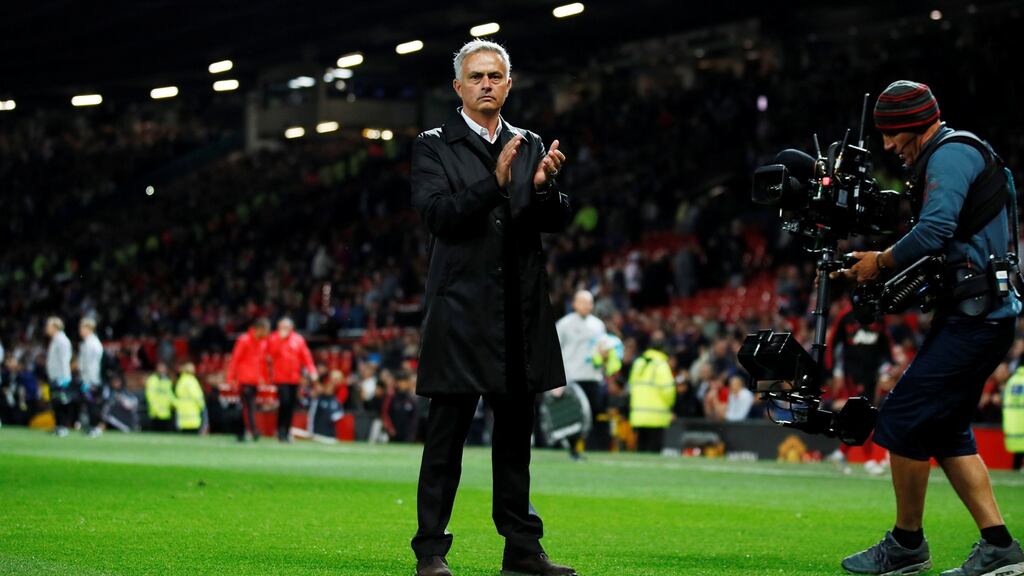 Jose Mourinho makes a point of applauding the fans after the 3-0 home defeat to Spurs at Old Trafford.  Photograph: Jason Cairnduff/Reuters