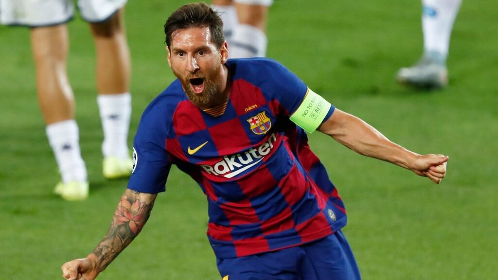 Lionel Messi celebrates after scoring Barcelona’s second against Napoli. Photograph: Joan Monfort/AP