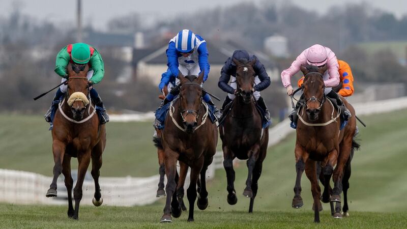 Chris Hayes on Lemista (blue and white) comes home to win The Lodge Park Stud Irish EBF Park Express Stakes on the first day of the Irish Flat season at Naas. Photograph: Morgan Treacy/Inpho