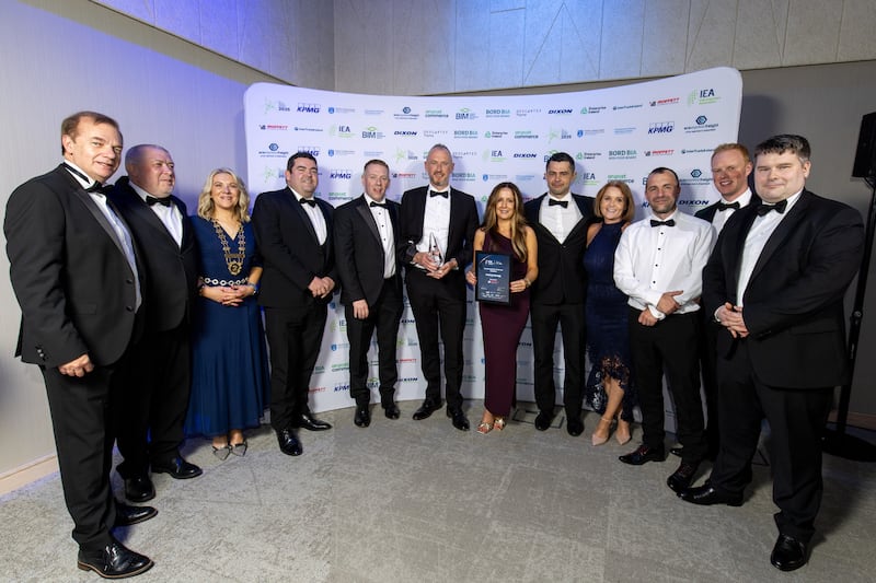 Simon McKeever and Gabrielle White of the Irish Exporters Association, with the team of Hanley Energy, winner of the service exporter of the year category, sponsored by Moffett Automation, and Sam Moffett, chief executive of Moffett Automation. Photograph: Karl Hussey Photography